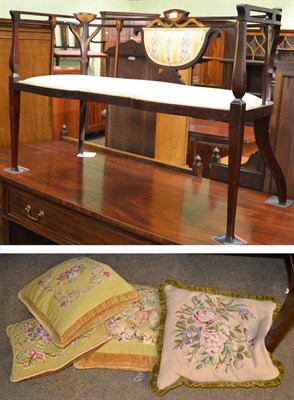 Lot 1353 - An Edwardian inlaid mahogany small settee and four needlework cushions