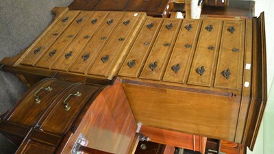 Lot 1354 - An early 20th century walnut chest on chest of small proportions