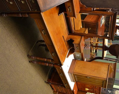 Lot 1359 - A late Victorian mahogany dressing table, marble top washstand and bedside cupboard, by James...