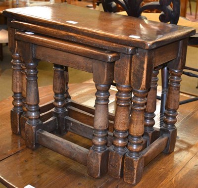 Lot 1370 - Reproduction nest of three oak tables