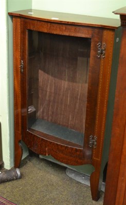 Lot 1373 - Edwardian mahogany inlaid bow front glazed cabinet