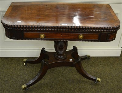 Lot 1396 - A Regency rosewood crossbanded plum pudding mahogany fold-over tea table