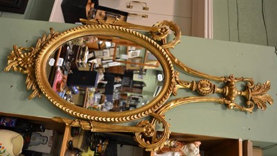 Lot 1400 - A reproduction gilt framed mirror