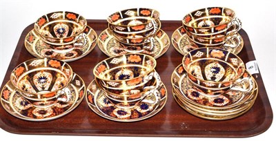 Lot 8 - Royal Crown Derby Imari; a set of nine tea cups and saucers pattern number 6630