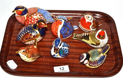 Lot 12 - A group of eight various Royal Crown Derby bird paperweights