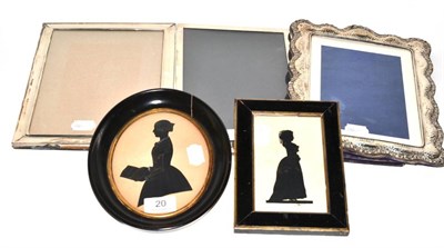 Lot 20 - Three silver photograph frames and a pair of silhouettes
