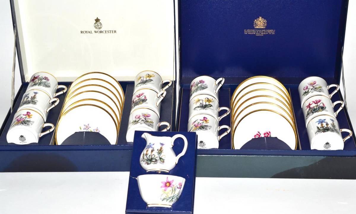 Lot 22 - Two cased sets of six Royal Worcester coffee cans and saucers and an egg coddler