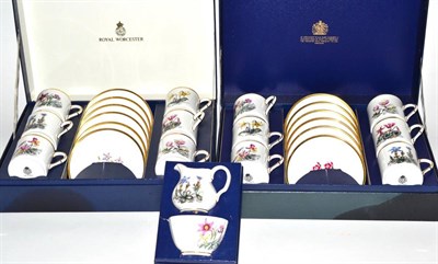Lot 22 - Two cased sets of six Royal Worcester coffee cans and saucers and an egg coddler