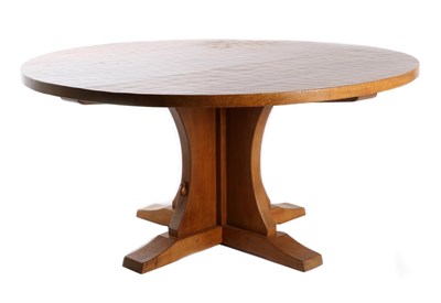 Lot 564 - Mouseman: A Robert Thompson English Oak 5ft Circular Dowelled Table, on a cruciform base, with...