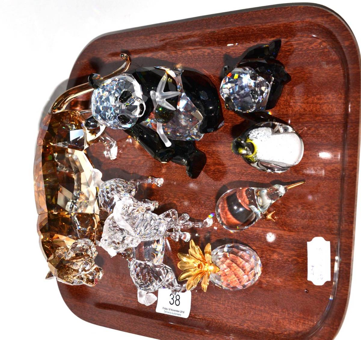 Lot 38 - Swarovski Tiger, Horse group, Panda and Panda Cub, and a Pineapple; together with a glass bird...