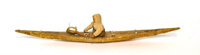 Lot 52 - An early 20th century souvenir Inuit model kayak