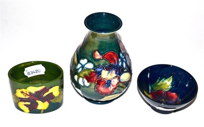 Lot 57 - A small Moorcroft vase, a Moorcroft small bowl and an oval shaped small vase (3)