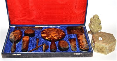 Lot 68 - A 1930's Chinese tortoiseshell dressing table set engraved with dragons, cased and a soapstone...