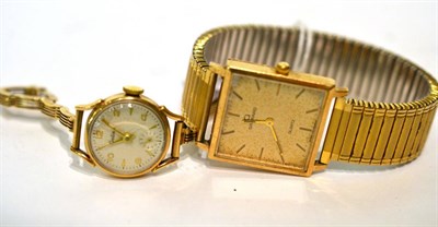 Lot 100 - A 9ct gold Garrard wristwatch and a 9ct gold lady's wristwatch