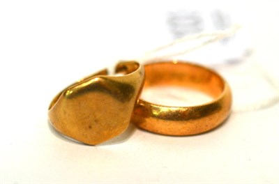 Lot 103 - A 9ct gold signet ring and a band ring, stamped '9ct' (2)