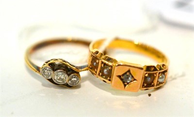 Lot 107 - A 15ct gold seed pearl and diamond ring and a three stone diamond ring (2)