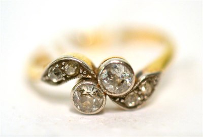 Lot 118 - An old cut diamond two stone twist ring, total estimated diamond weight 0.60 carat approximately