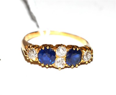 Lot 120 - A sapphire and diamond ring