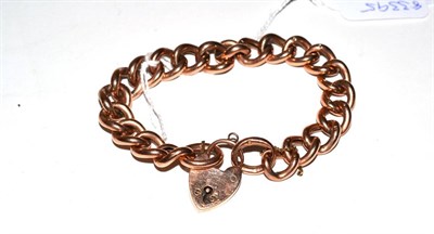 Lot 122 - A curb link bracelet with padlock clasp (stamped 9ct)