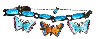 Lot 136 - A pair of enamelled butterfly brooches, an enamelled bracelet and another enamel butterfly brooch
