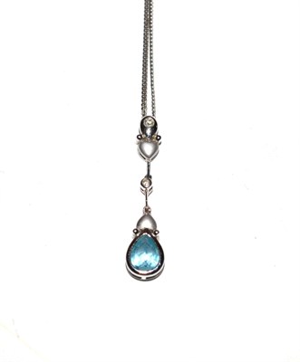 Lot 152 - An aquamarine and diamond pendant
