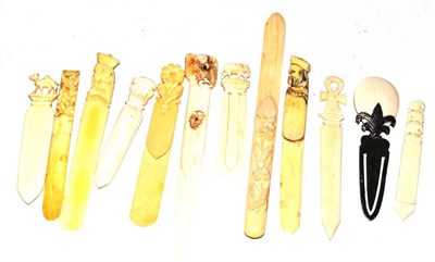 Lot 155 - A group of twelve late 19th and early 20th century carved ivory bookmarks