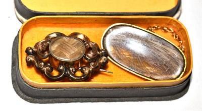 Lot 160 - Two Victorian yellow metal mourning brooches