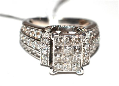 Lot 162 - A diamond cluster ring, stated diamond weight 1.50 carat