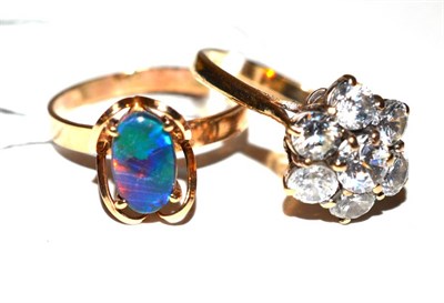 Lot 165 - An opal triplet ring and a 9ct gold white stone cluster ring (2)