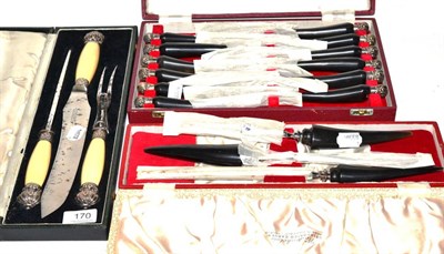 Lot 170 - Cased silver and ivory carving set marked for Sheffield 1898 and two cased sets of cutlery
