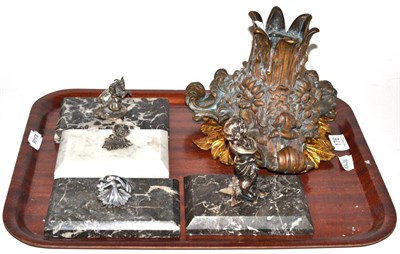 Lot 176 - A collection of marble paperweights and a bronze foot