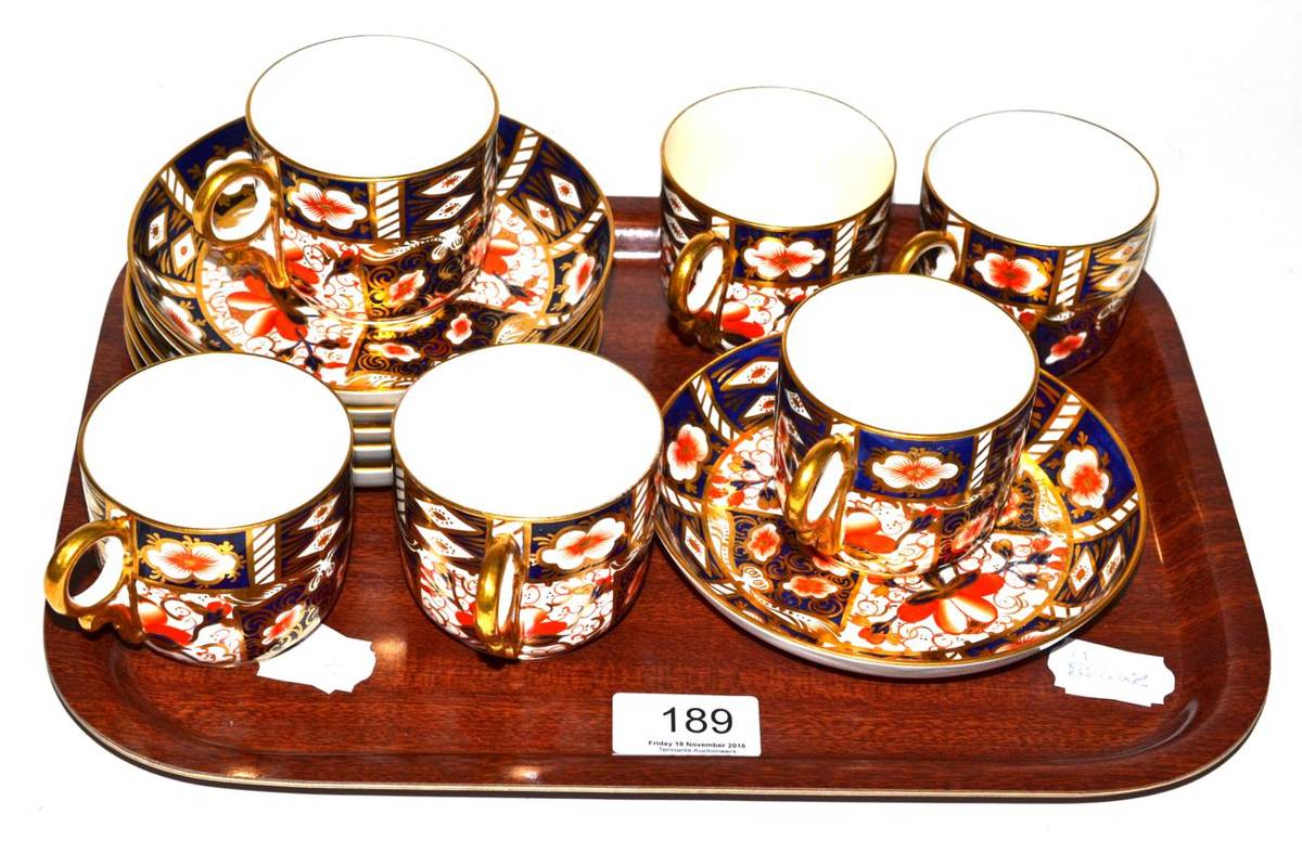 Lot 189 - Royal Crown Derby Imari; a harlequin set of six coffee cans and saucers, pattern number 2451