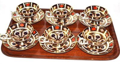 Lot 191 - A set of six Royal Crown Derby Old Imari 1128 Elizabeth footed tea cups and saucer (first quality)