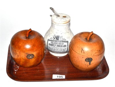 Lot 195 - Two apple tea caddies and a marbled pottery Saunders family inhaler