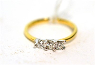 Lot 229 - A diamond three stone ring
