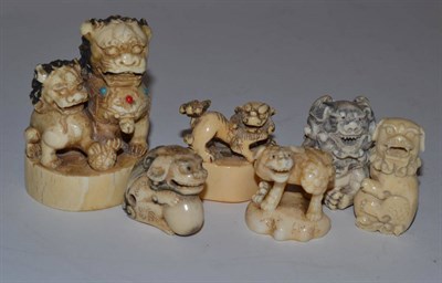 Lot 233 - Six various carved ivory dogs of Fo, late 19th/early 20th century