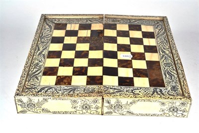 Lot 295 - A 19th century Vizagapatam chess/backgammon board with ivory and tortoiseshell inlay, 37.5cm wide