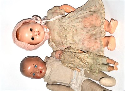 Lot 302 - Three dolls (a.f.)