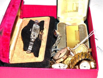 Lot 330 - Ten metal and gold cased watches, a fob watch and a cased Dunhill lighter