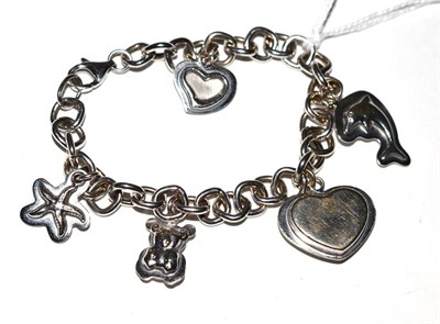 Lot 339 - A charm bracelet stamped '750'