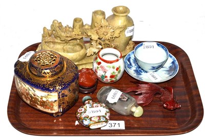 Lot 371 - A group of Chinese and Japanese works of art including a Nanking Cargo tea bowl and saucer,...