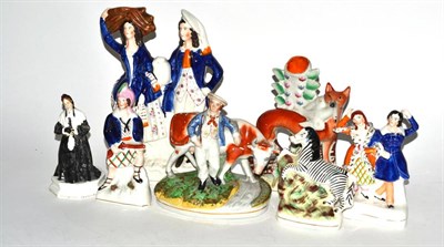 Lot 395 - Six Staffordshire pottery figural/animal groups and a Royal Doulton figure Mr W S Penley as...