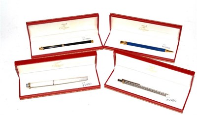 Lot 420 - Four cased Must de Cartier pens (three ballpoint pens and a fountain pen)