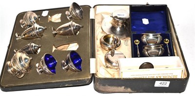 Lot 422 - A quantity of silver including a cased pair of salts with silver gilt interiors, capstan inkwell, a