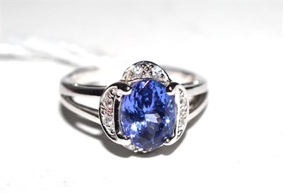 Lot 427 - An 18ct white gold, tanzanite and diamond ring