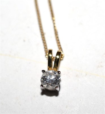 Lot 429 - A diamond solitaire pendant, with an 18ct gold suspension loop, the clasp stamped '375'