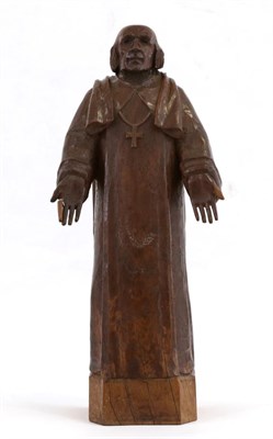 Lot 606 - Mouseman: A 1930s Robert Thompson Carved English Oak Statue of a Bishop, with palms turned outward