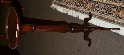 Lot 458 - A mahogany torchere