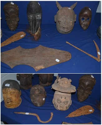 Lot 1001 - A Yoruba, Nigeria helmet mask; two Makonde, Lipiko helmet masks,  Tanzania; a Dan, Ivory Coast bird