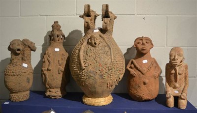 Lot 1002 - Five Djenne style terracotta figures decorated with raised pustules